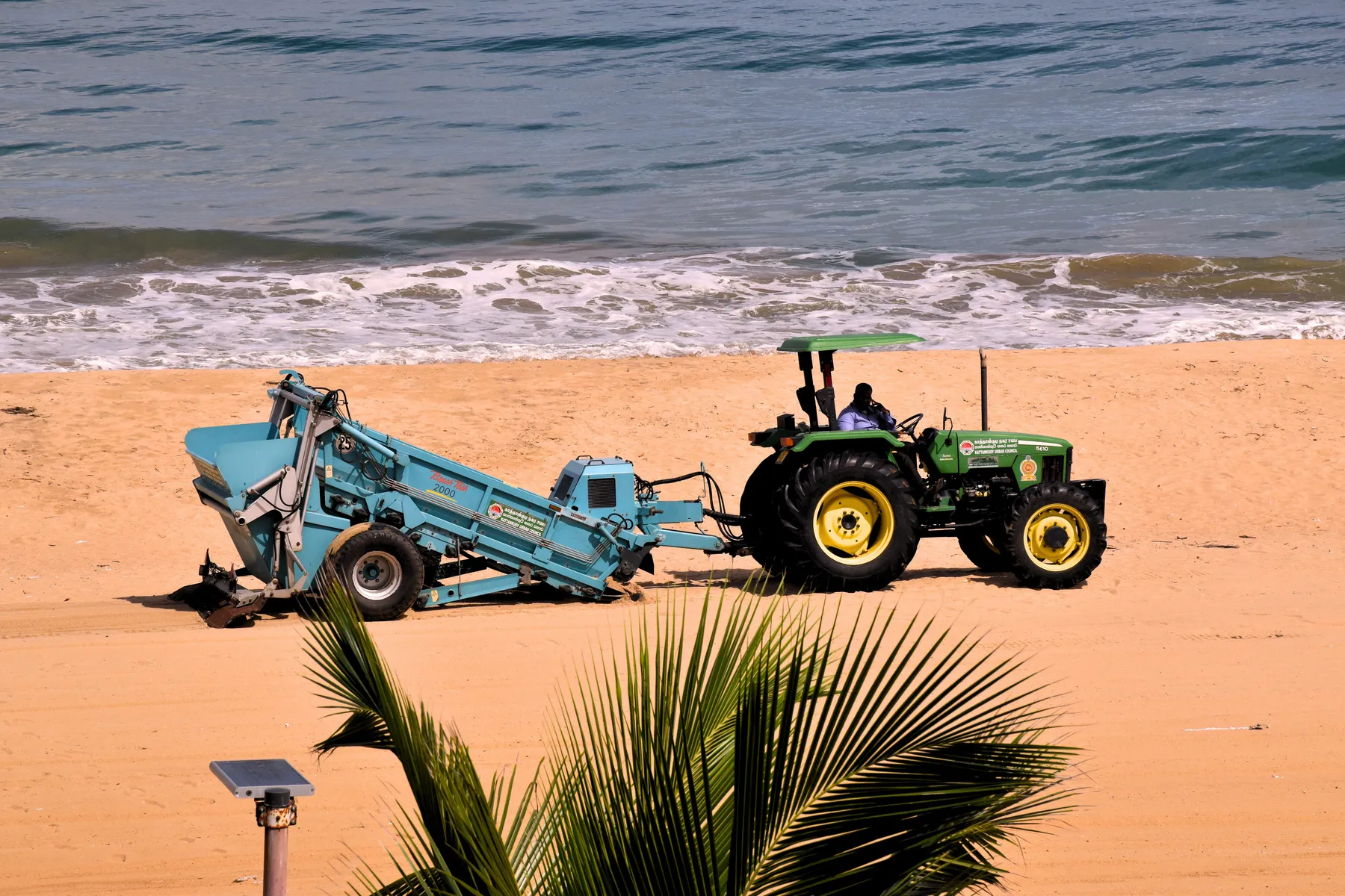 The Beach Tech machine cleaning the beach